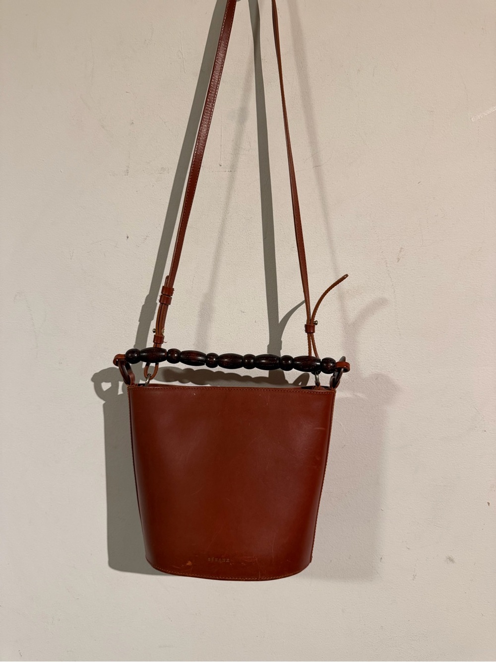 Sezane Chestnut Leather Bucket Bag with Dark Wood Bead Handle